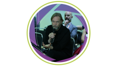 pec image of attendees speaking